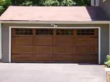 Green Door! The Elite wood fiber technology is made to withstand the toughest climactic conditions without warping, swelling, rusting or cracking. New England Door - Elite Carriage House Door. Job completed in Wilton, CT