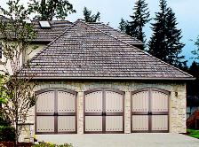 Green Door! The Elite wood fiber technology is made to withstand the toughest climactic conditions without warping, swelling, rusting or cracking. New England Door - Elite Carriage House Door
